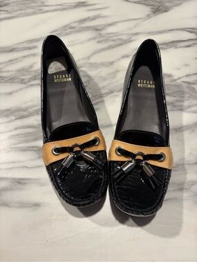 Stuart Weitzman Black Patent Loafers with Tan Trim and Tassels